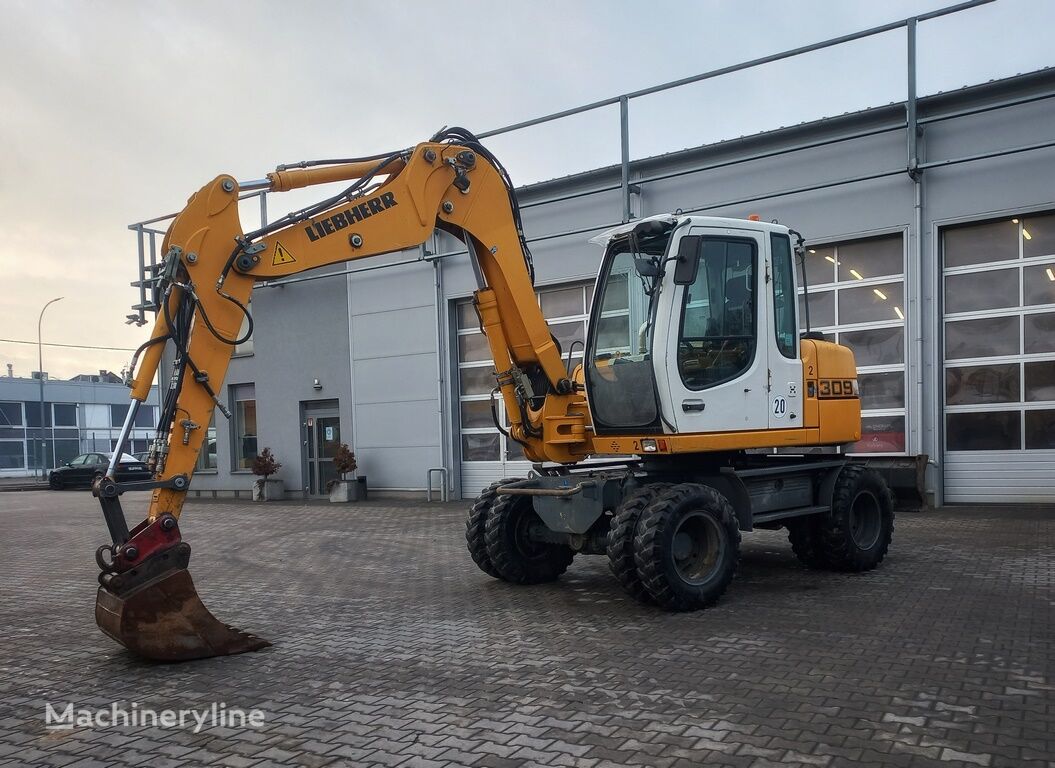 휠 굴착기 Liebherr A 309 Litronic